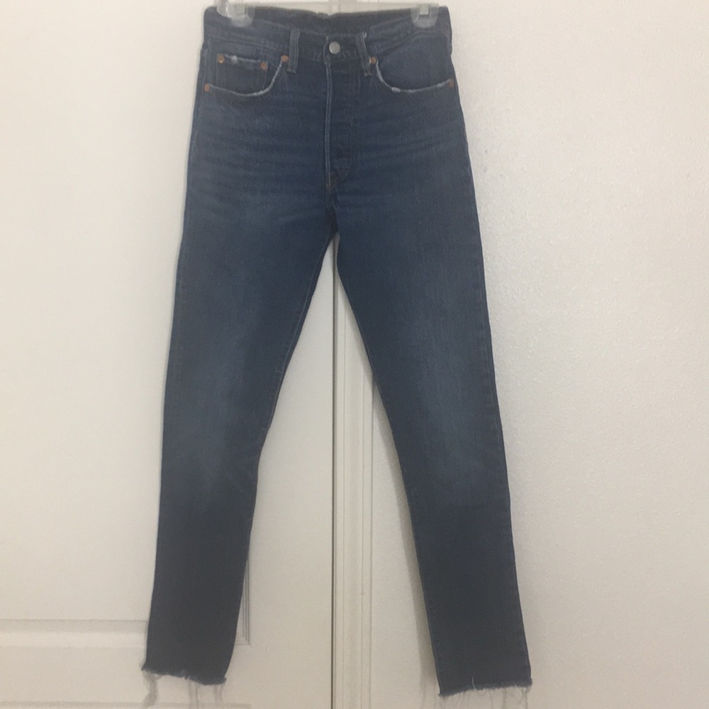 501s size 26. Raw hem. Lightly used